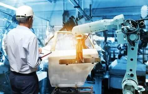 platinum parts being used in the making of a car in a factory