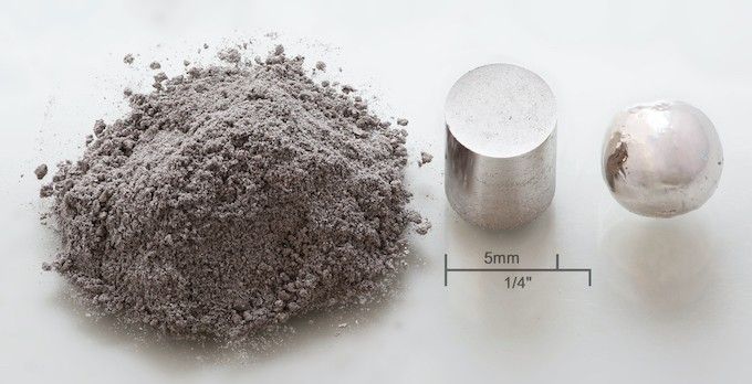 rhodium in various physical forms, powdered, pressed and balled